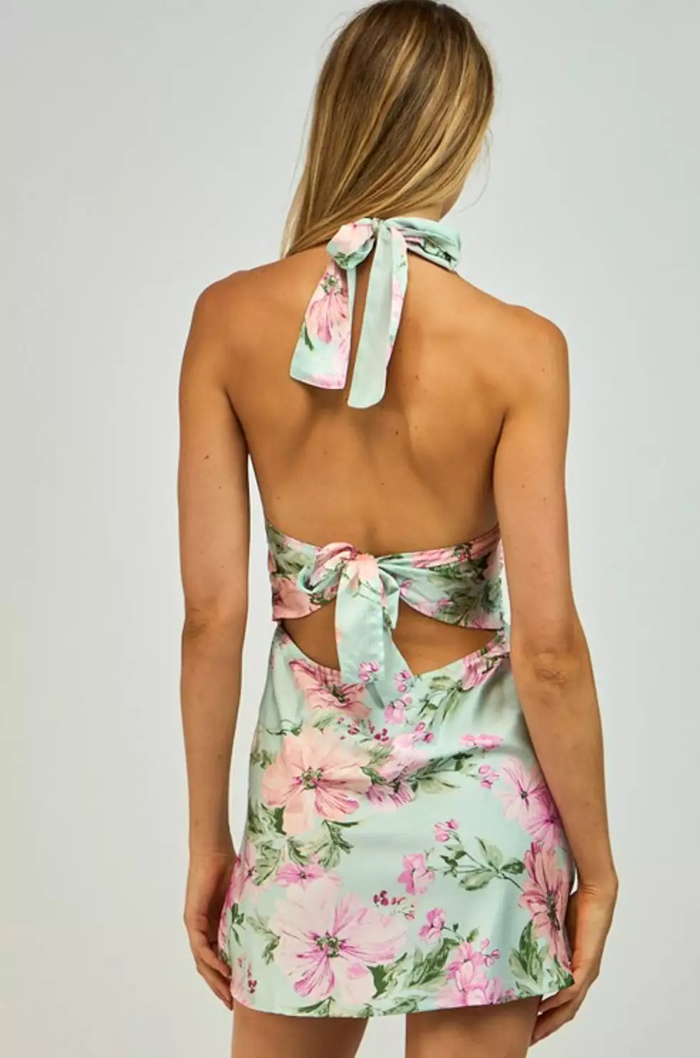 Minty. Floral halter open back waist tie mini dress